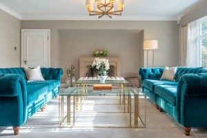 Aqua Sofas and Glass Table Living Room